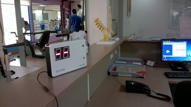 Nurse Station Console - Centralized nurse station display monitoring multiple patient rooms with real-time call alerts and room status indicators.