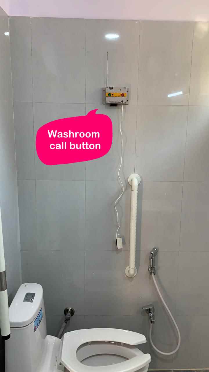 Washroom Pull Chord - Pull chord system installed in hospital washroom for patient safety and emergency alerts.