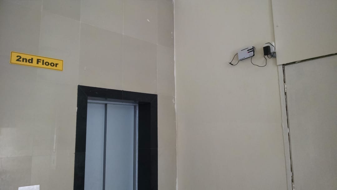 Elevator Alarm Repeater - Specialized repeater installation for elevator emergency alarm system connectivity.