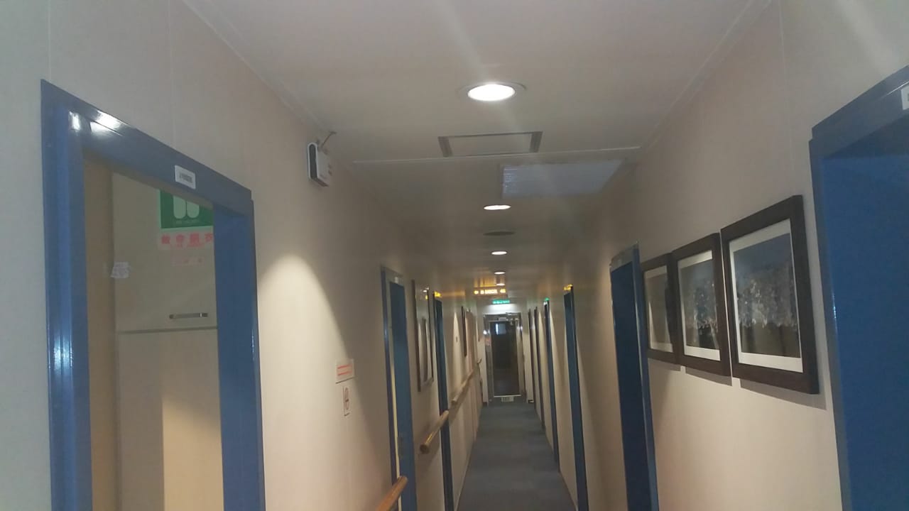Signal Booster Units - High-power signal repeater units for extending wireless coverage across large healthcare facilities.