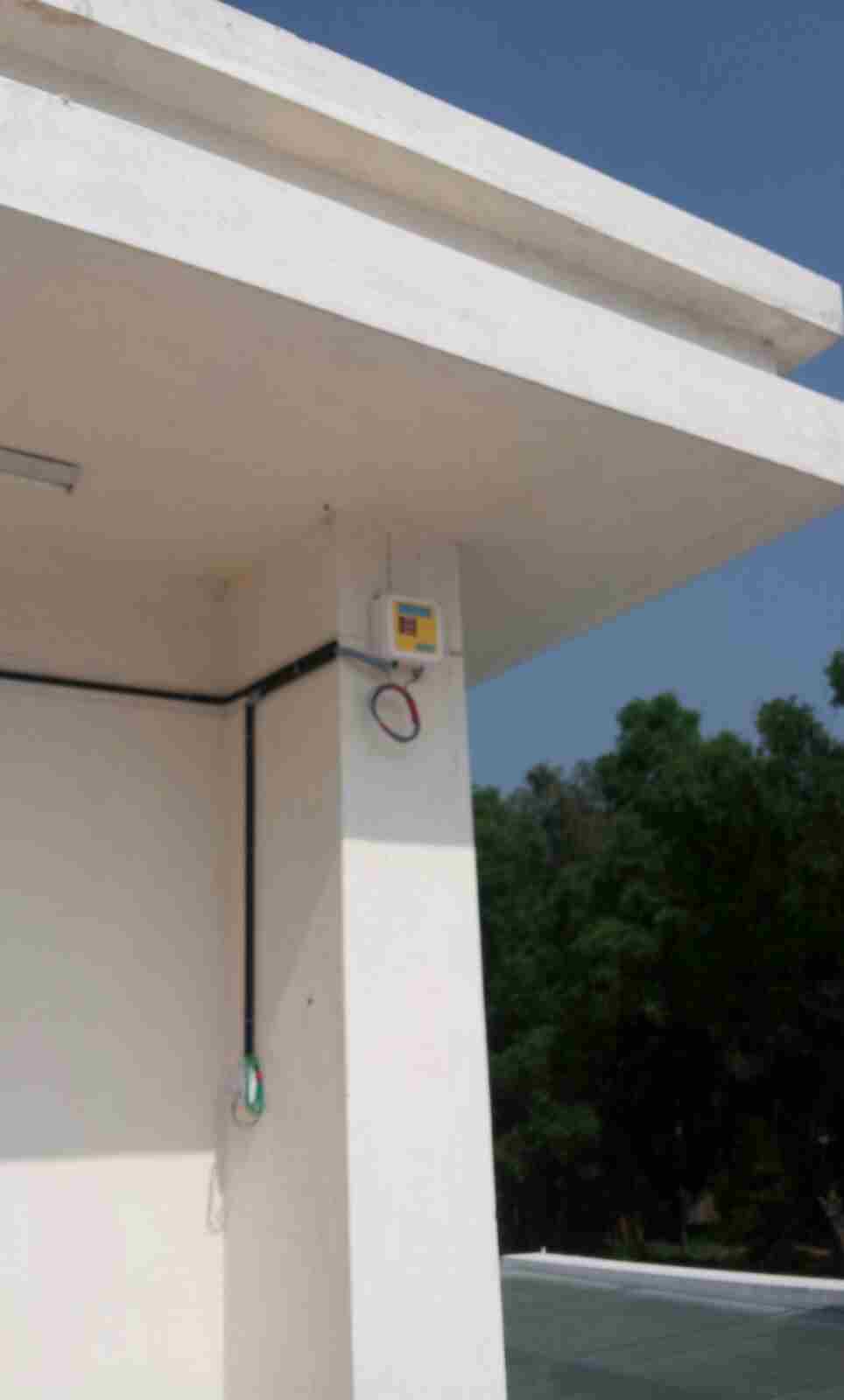 Industrial Transmitter Setup - Professional transmitter installation in industrial environment with weatherproof enclosure.